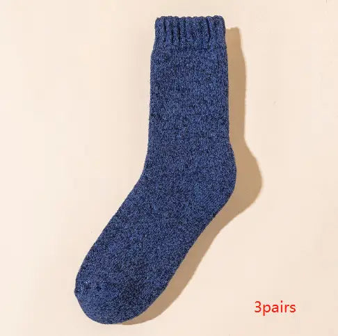 A cozy navy blue thick wool sock for men with a ribbed cuff and soft textured fabric designed for winter warmth.