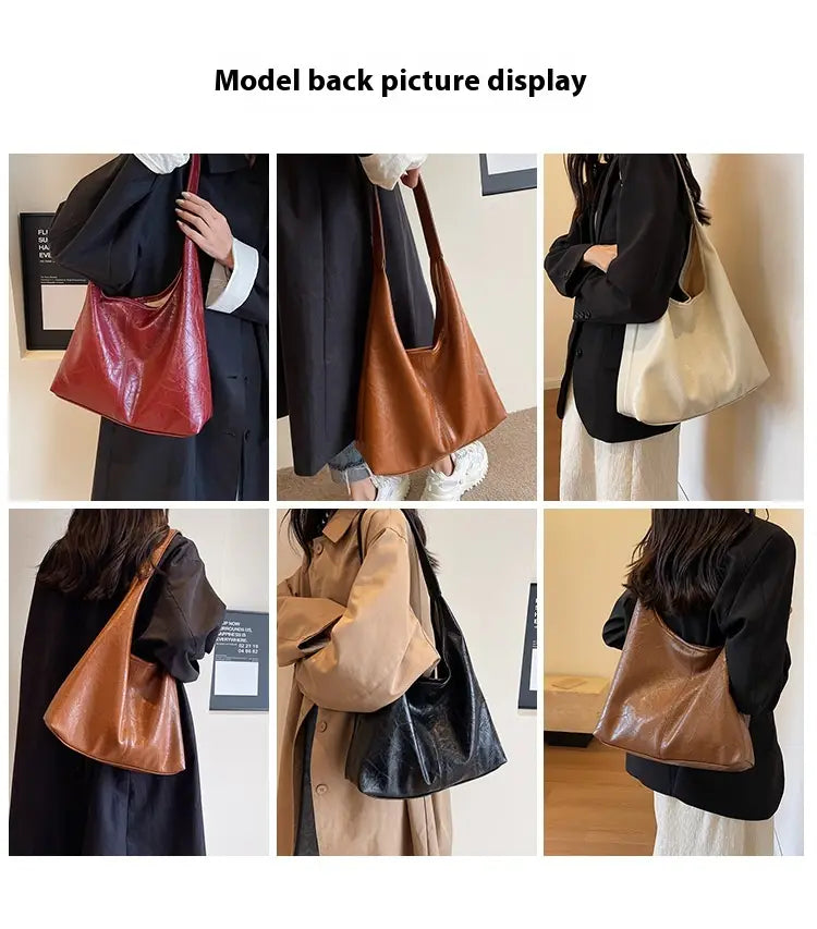 Eine Vintage-Leder-Tragetasche mit großer Kapazität als Schulterhandtasche aus elegantem, glänzendem Kunstleder mit satten Rot-, warmen Braun-, cremig-beigen und tiefschwarzen Tönen.