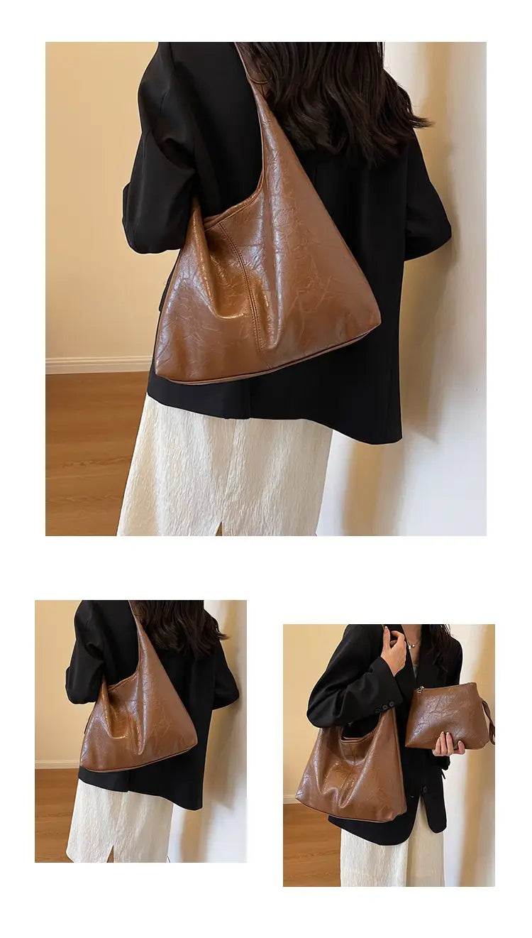 Braune Hobo-Tasche aus Leder mit weicher, hängender Silhouette und einem einzelnen Schulterriemen, entworfen als Vintage-Leder-Tragetasche mit großer Kapazität für die Nutzung an der Schulter.