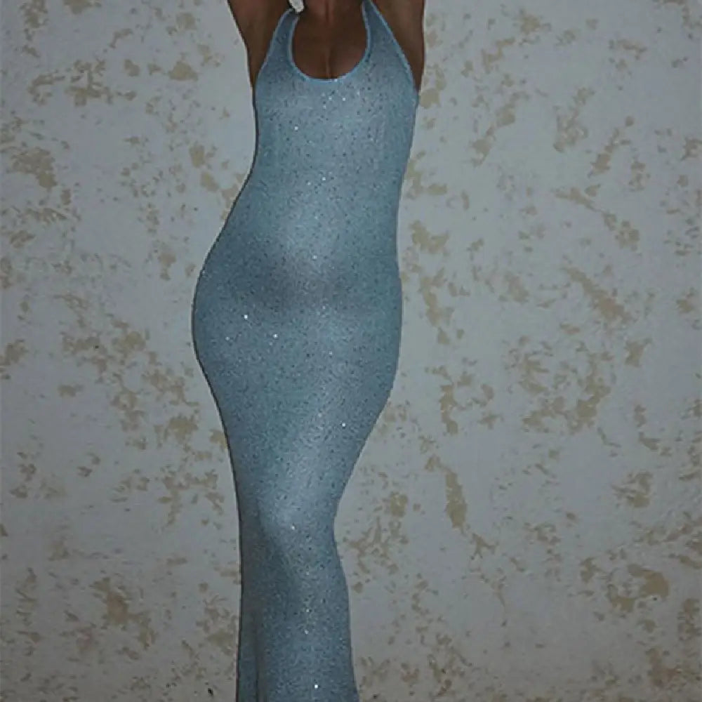 A shimmering light blue sequined halter-neck sleeveless bodycon maxi dress with a form-fitting silhouette.