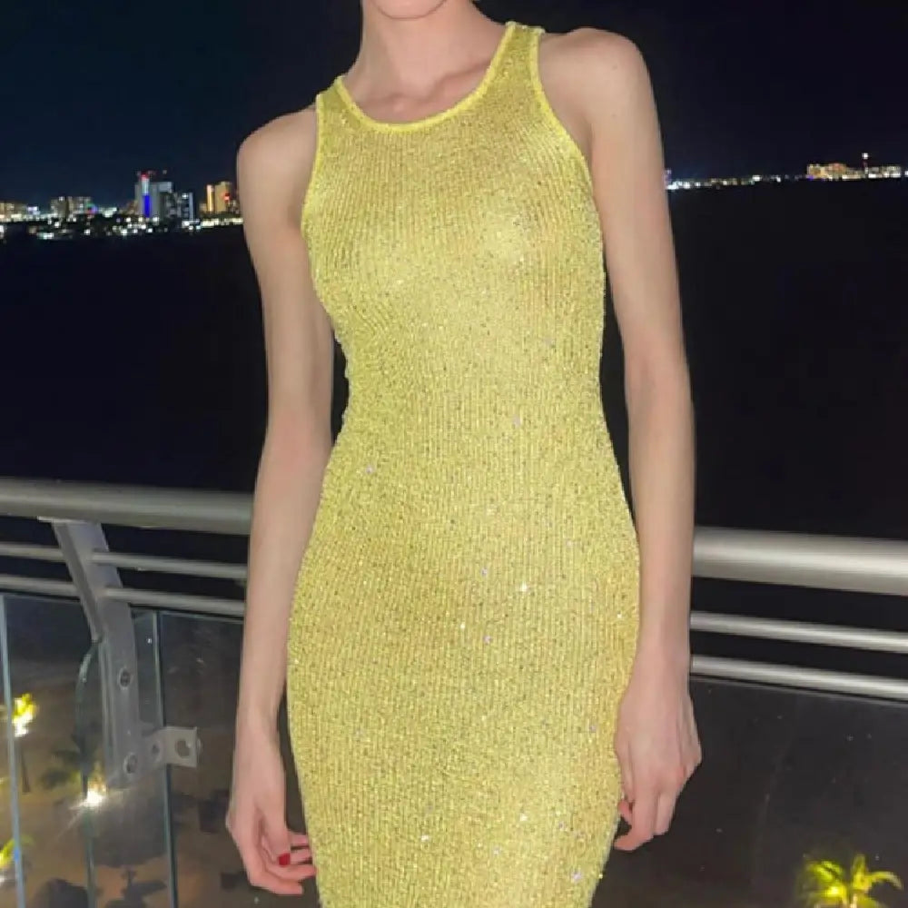 A shimmering yellow sequined knit sleeveless bodycon maxi dress with a high-neck design.