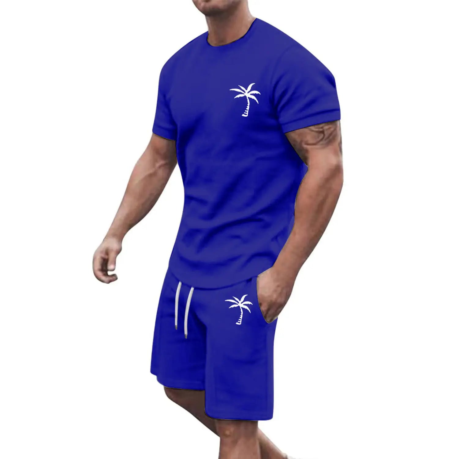 Royal blue two-piece athletic set with white palm tree embroidery on the chest and shorts designed for tropical activewear.