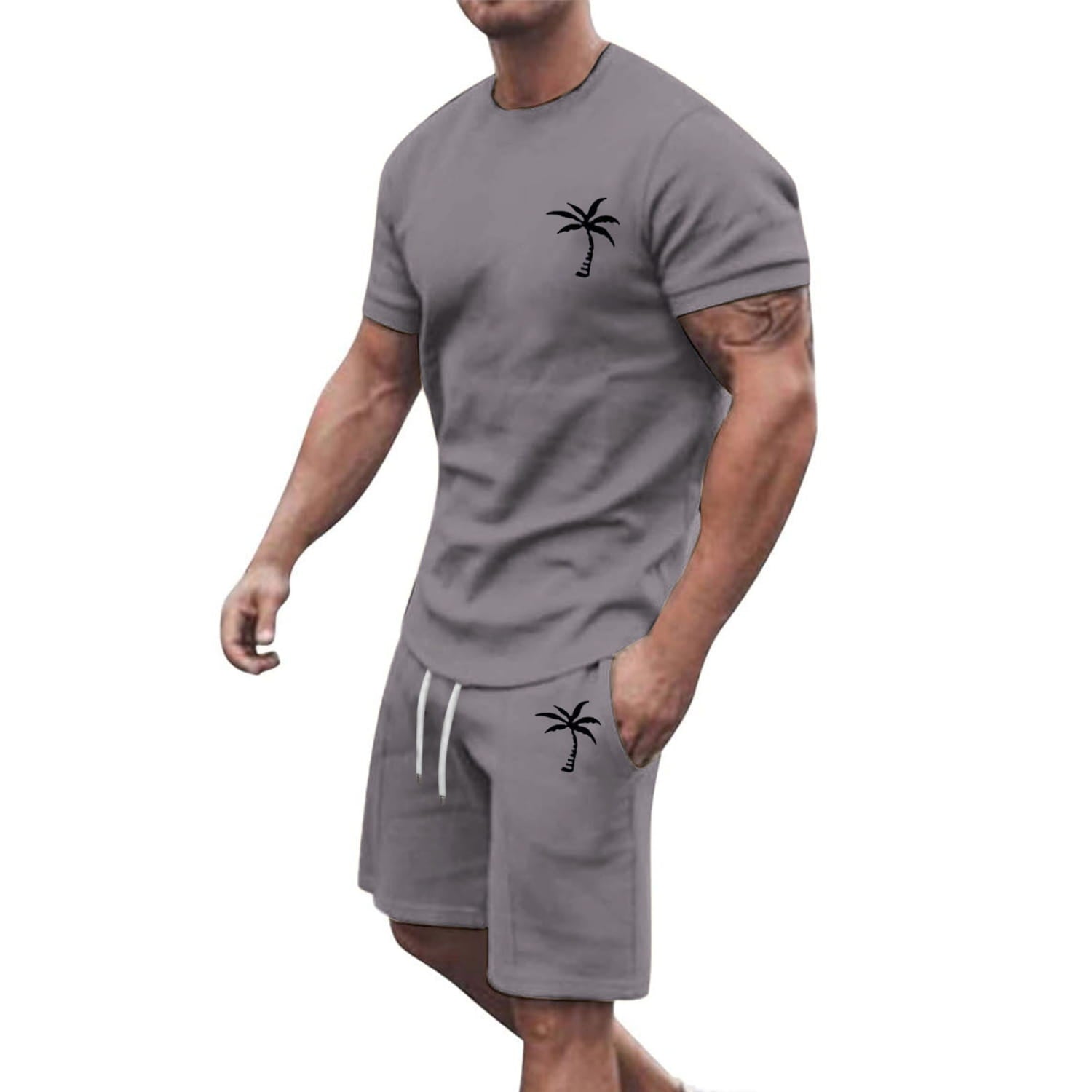 Gray tropical palm tree athletic shorts with white drawstrings and black embroidery on the front from the tropical palm tree short sleeve athletic set.
