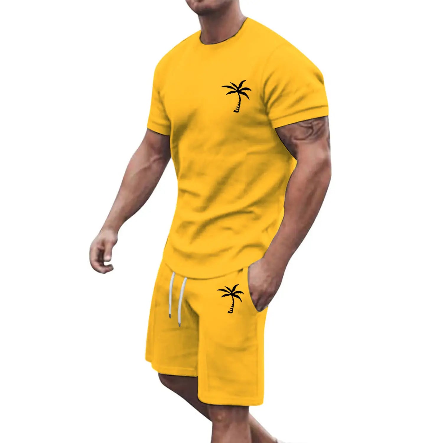 Bright yellow tropical palm tree short sleeve athletic set with black palm tree embroidery on the chest and thigh designed for activewear use.