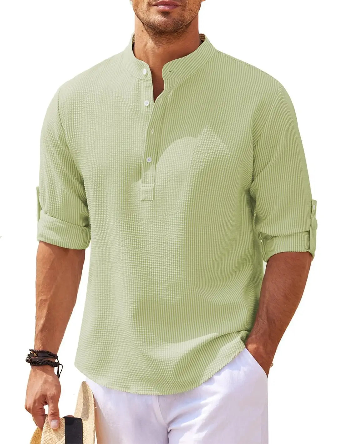 Men’s casual light green ribbed cotton blend shirt with short sleeves, button-up front, stand collar, and rolled cuffs.