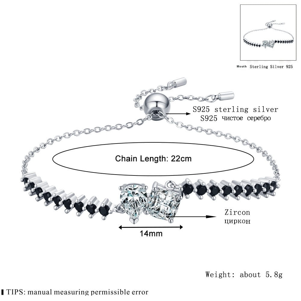A delicate s925 sterling silver bracelet featuring a central cluster of two clear zircon stones flanked by black zircons with an adjustable chain and ball clasp from the sterling silver zircon heart pendant and bracelet set.