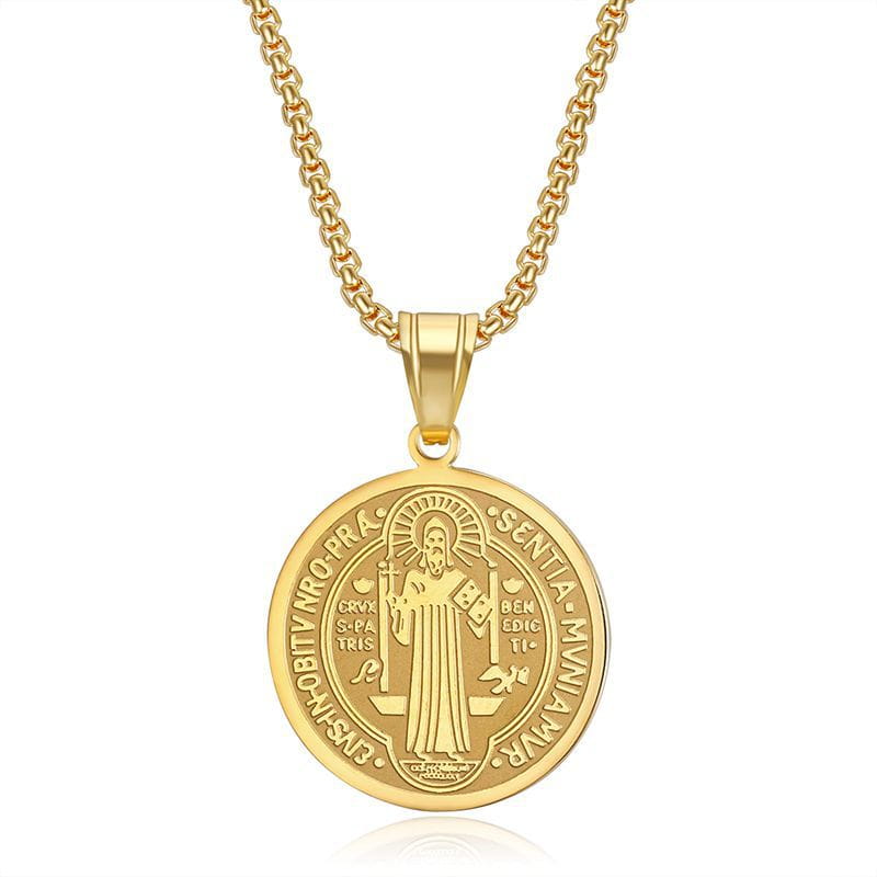 Stainless steel saint benedict medal pendant necklace in gold tone with engraved religious imagery and latin inscriptions suspended from a matching gold chain.