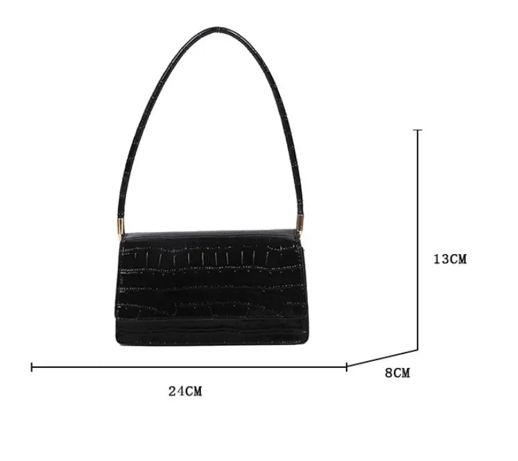 Black crocodile-embossed underarm bag with a glossy finish and gold-tone hardware made of high-end PU clutch material.