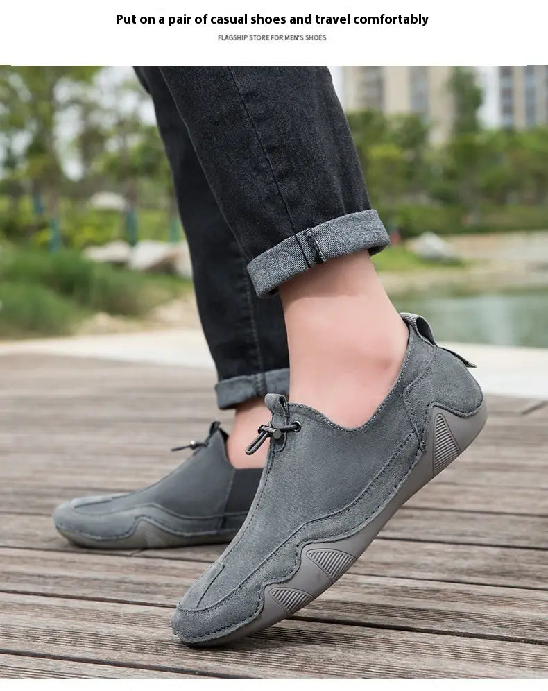 Gray suede leather loafers breathable slip on casual shoes with textured rubber sole and adjustable laces.