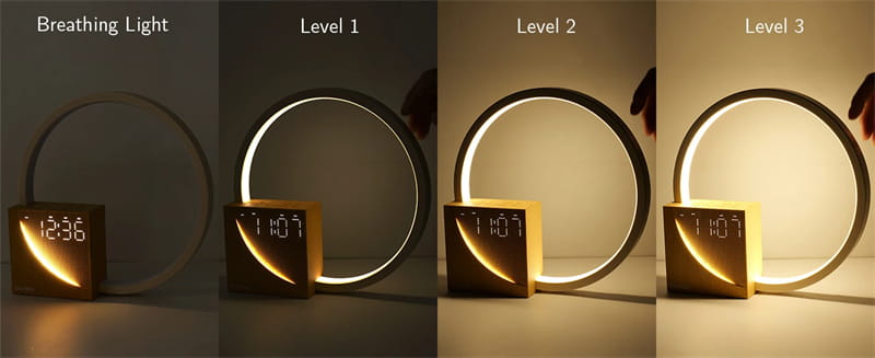 led bedside lamp with alarm clock and natural sounds featuring a modern minimalist led ring lamp with warm glow and digital clock display on a square base.