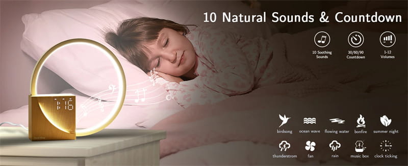 Golden circular led bedside lamp with digital display alarm clock and soothing natural sound features for nighttime use.