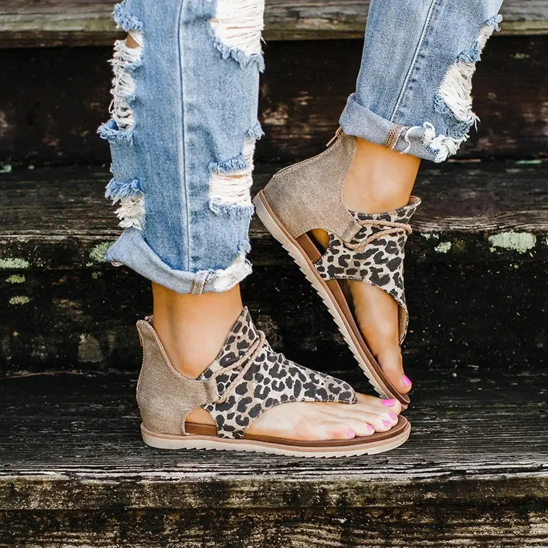 women sandals animal print flat thong strappy shoes featuring tan and leopard-print straps with a suede-like upper and flat sole