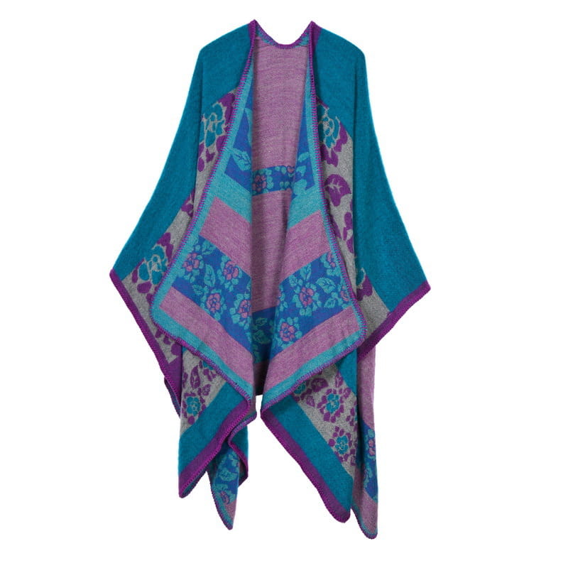 Cape en laine à carreaux surdimensionnée : poncho en maille géométrique vibrant bleu-vert et violet, avec des motifs floraux dans des tons de rose, bleu et beige, idéal pour les déplacements et un usage décontracté.