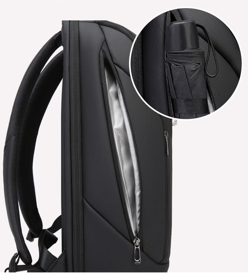 Black nylon men’s laptop travel backpack with usb charging features a sleek modern design and an internal zippered pocket holding a compact black umbrella.