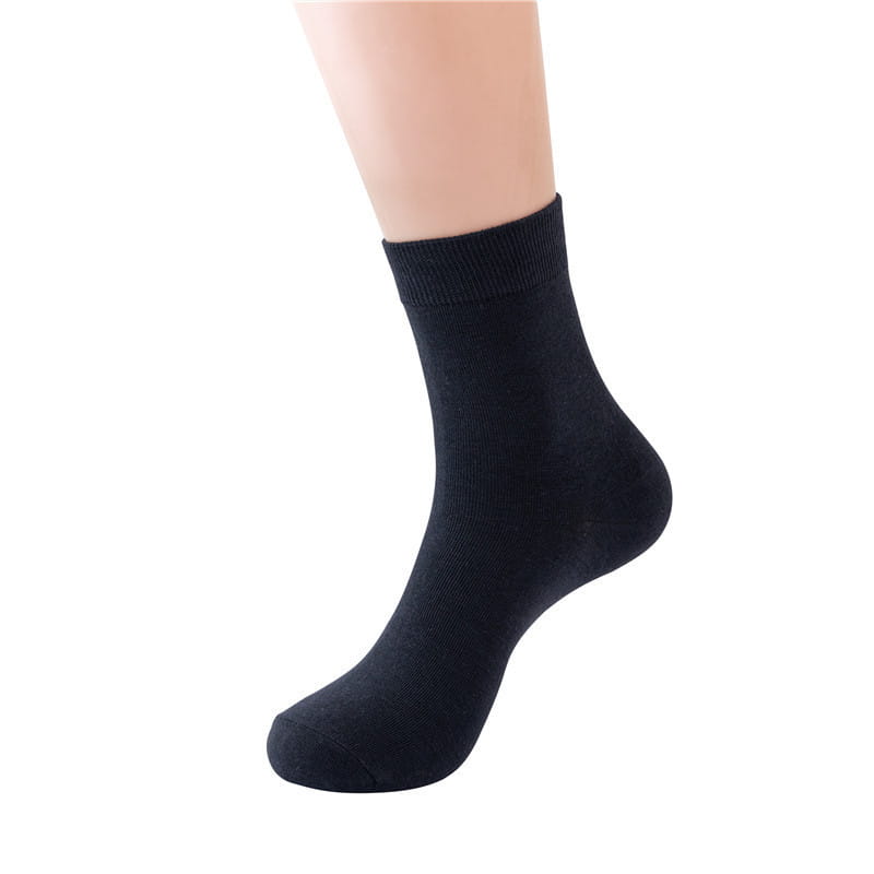 black cotton ankle sock with a ribbed cuff designed for breathable casual wear in solid color