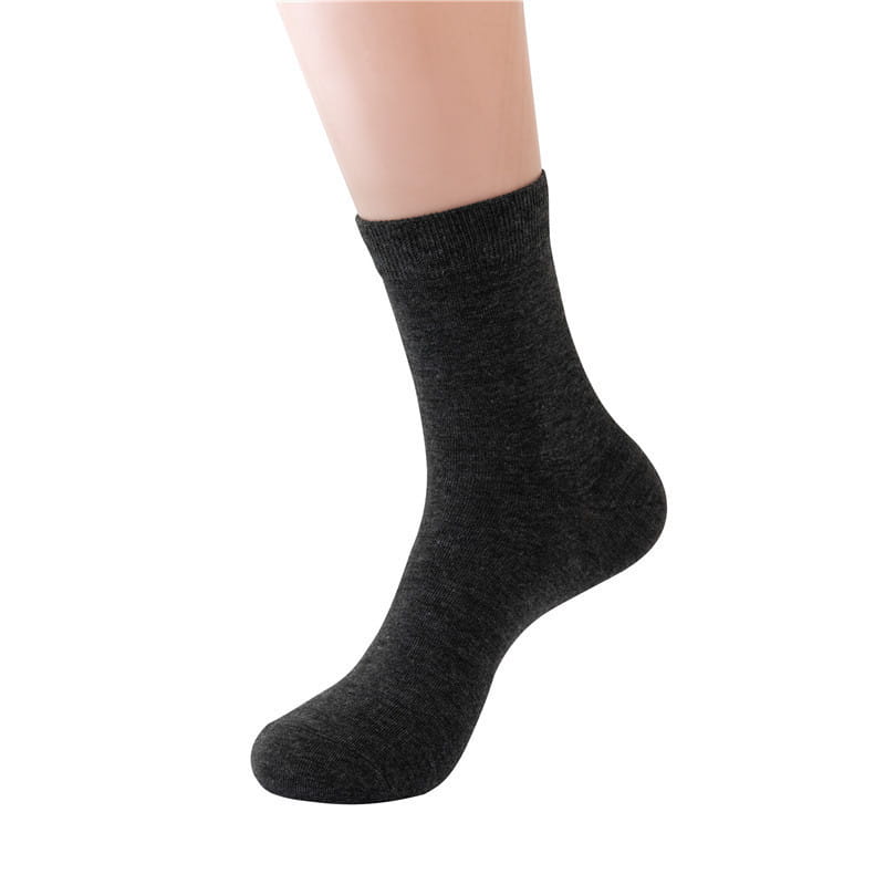 Dark gray heathered cotton ankle sock with a ribbed cuff designed as a breathable solid color mens casual crew sock.