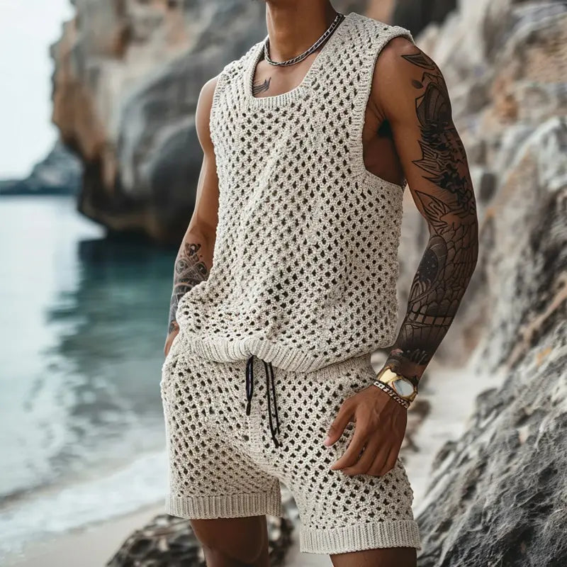 Men knit short sleeve shirt and shorts set in cream color featuring an open-knit sleeveless top and matching shorts with a drawstring waistband.