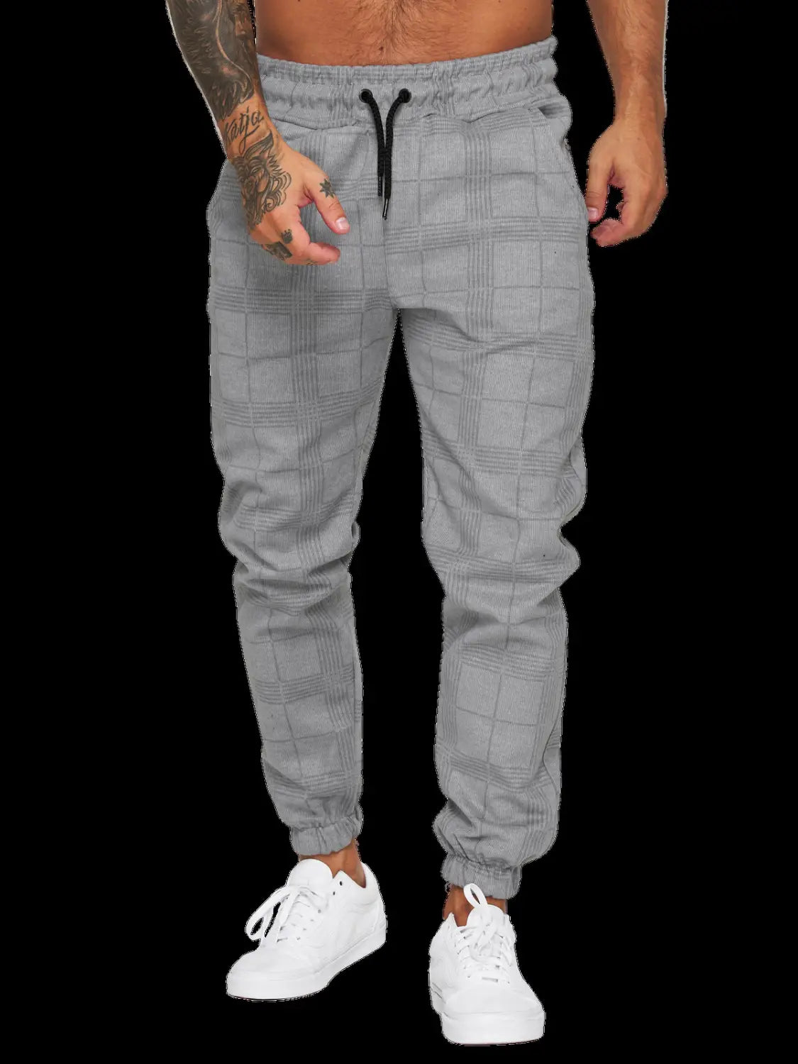 Checkered plaid jogger pants for men in gray featuring black drawstrings and elastic cuffs.