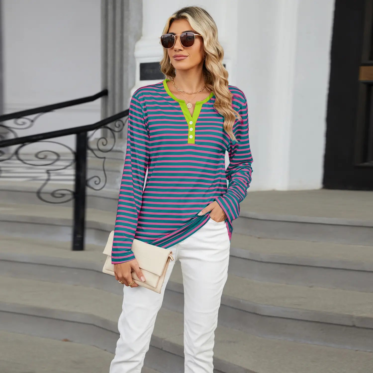 Striped contrast henley long sleeve v neck t shirt featuring horizontal teal and magenta stripes with a bright lime green collar and placket.