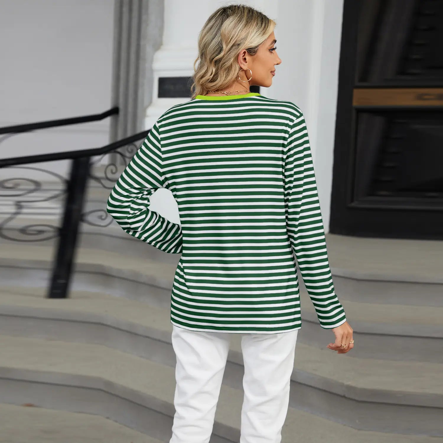 Green and white horizontally striped henley long sleeve v neck t shirt with contrast detailing and comfortable fabric.