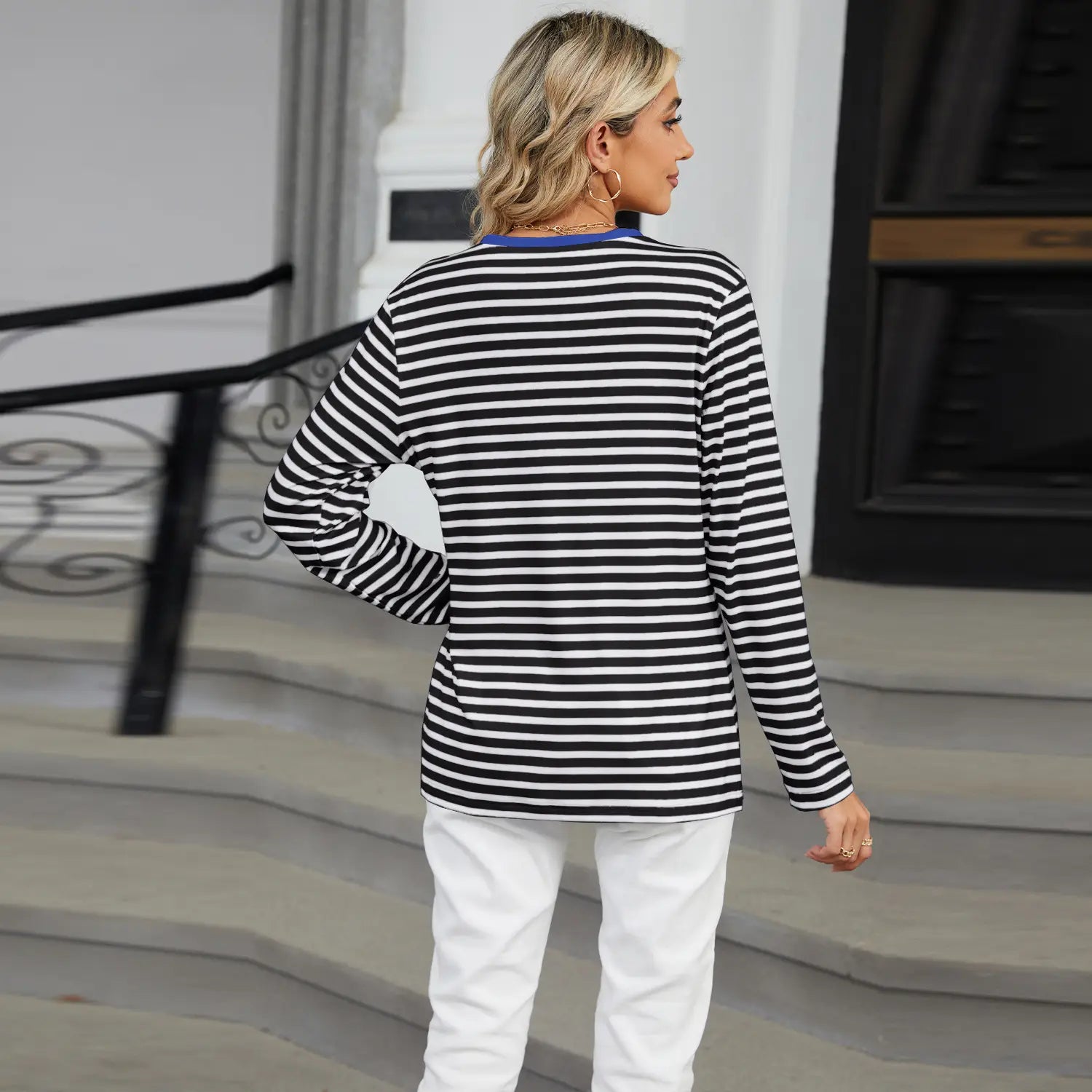 Striped contrast henley long sleeve v neck t shirt featuring black and white horizontal stripes with a blue collar in a soft cotton fabric.