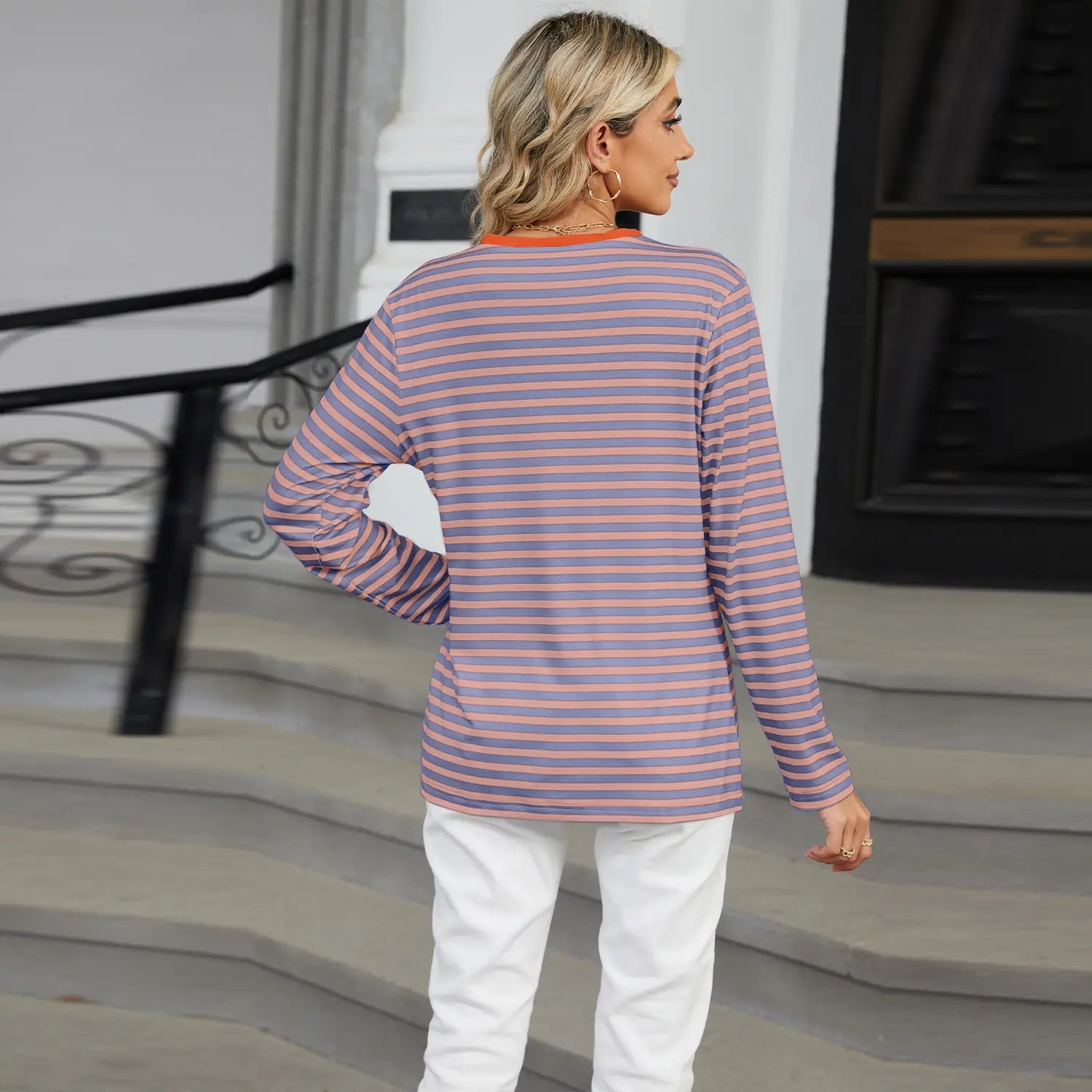 A soft striped contrast henley long sleeve v neck t shirt in muted purple and peach tones with horizontal stripes.