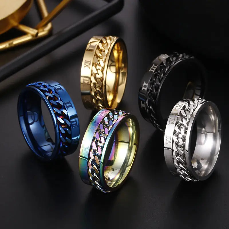 Roman numeral spinner chain rings with bottle opener feature stainless steel construction in blue gold black silver and iridescent finishes with engraved roman numerals.