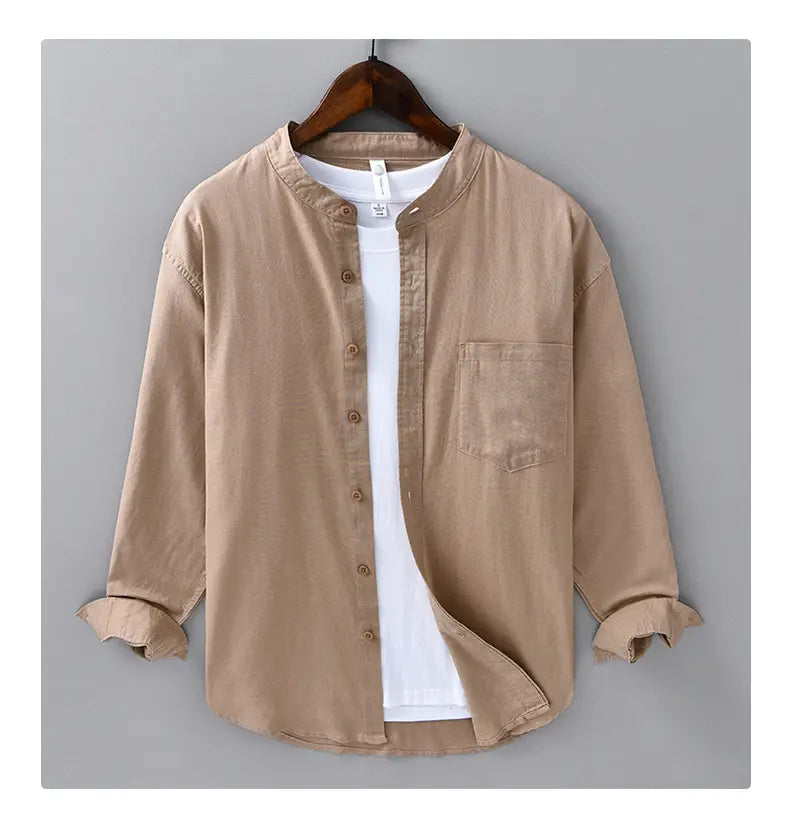 Beige long-sleeved Chinese style linen mandarin collar shirt for men featuring a stand collar button-up design and a chest pocket.