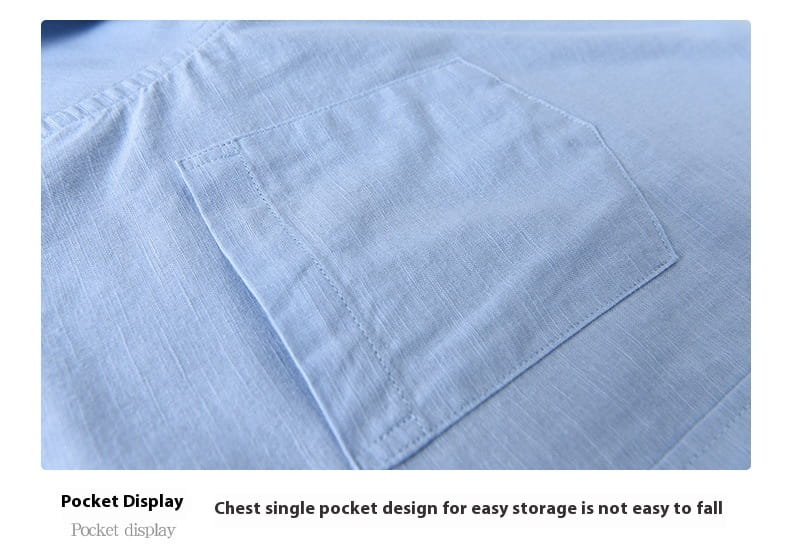 Light blue chest pocket with neat stitching and subtle textured fabric finish on a Chinese style linen mandarin collar shirt for men.