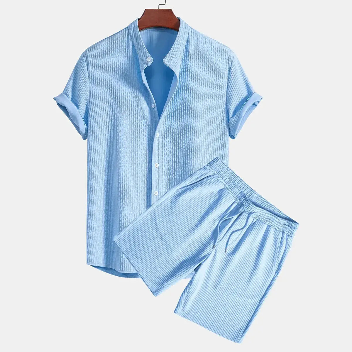 Light blue men ribbed matching short set featuring a short-sleeved button-up shirt with vertical ribbed texture and coordinating shorts.