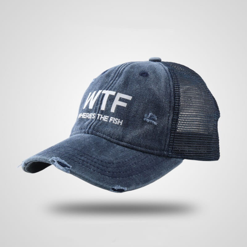 Distressed navy blue fishing trucker hat with white wtf where’s the fish embroidered lettering and mesh back.