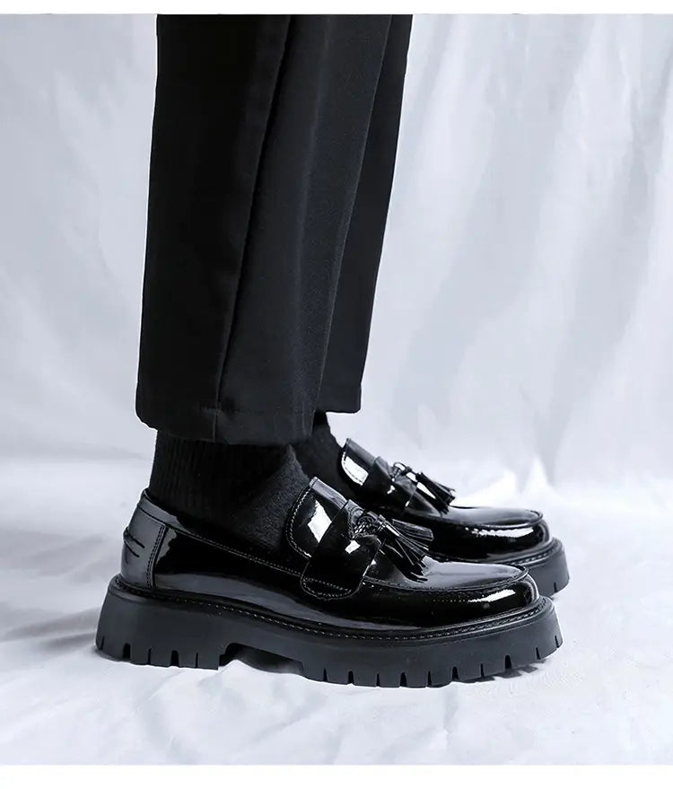 men’s black patent leather tassel loafer with chunky textured sole suitable for formal and casual wear