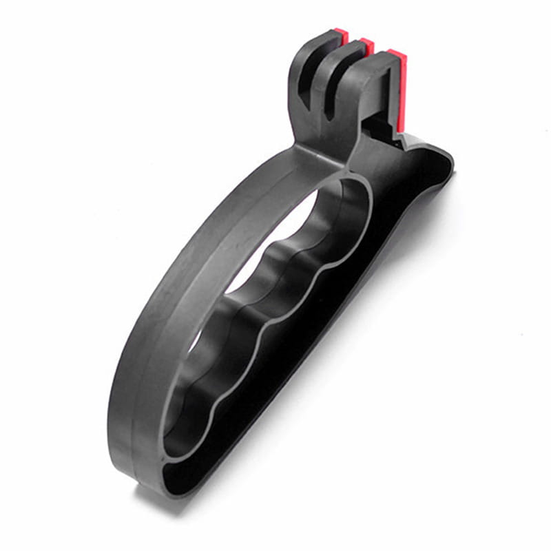 Black plastic knife sharpener with red accents and ergonomic finger-grip design for knife sharpener and scissor sharpening kitchen tool.