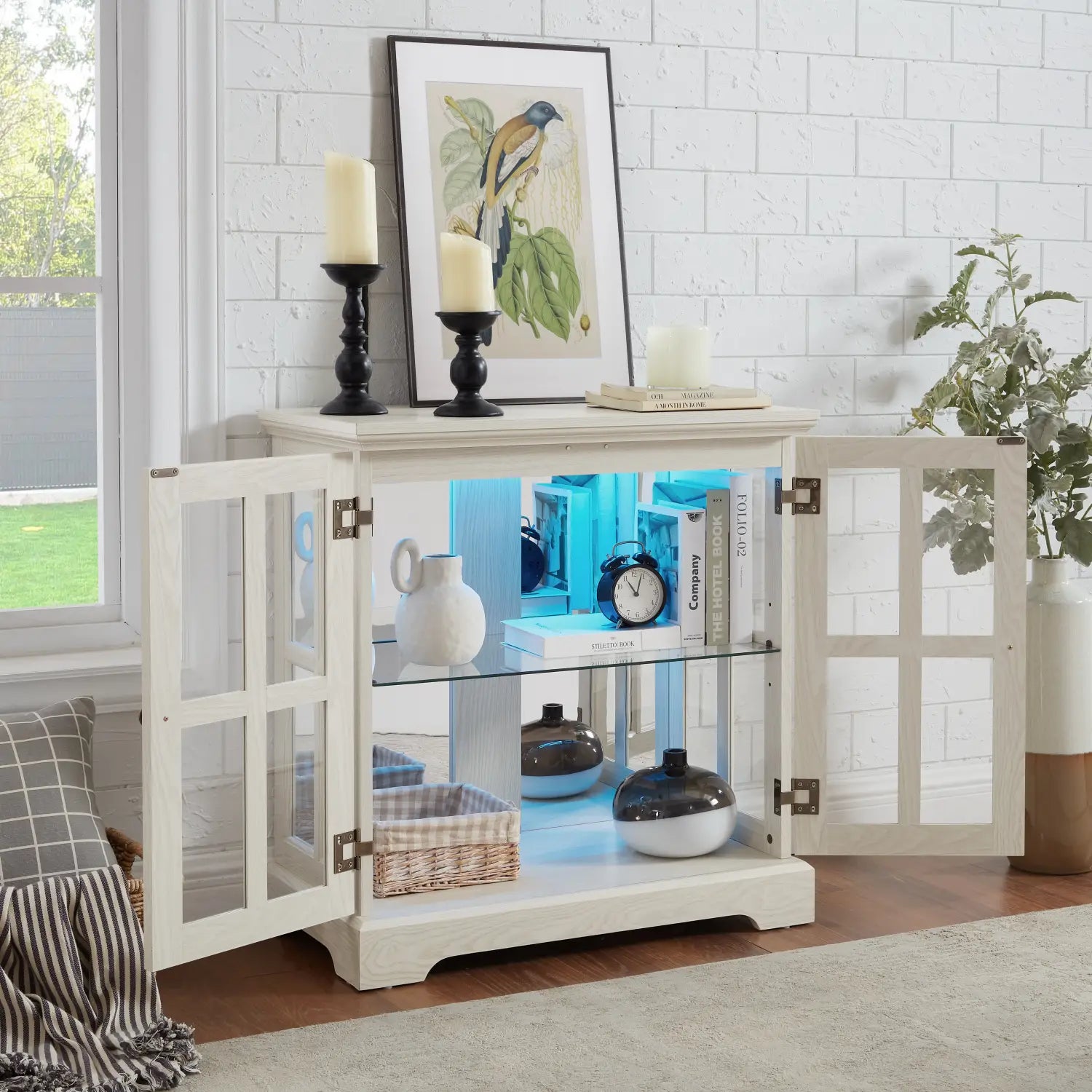 White led curio display cabinet with lattice glass-paneled doors and illuminated shelves for elegant storage and display.