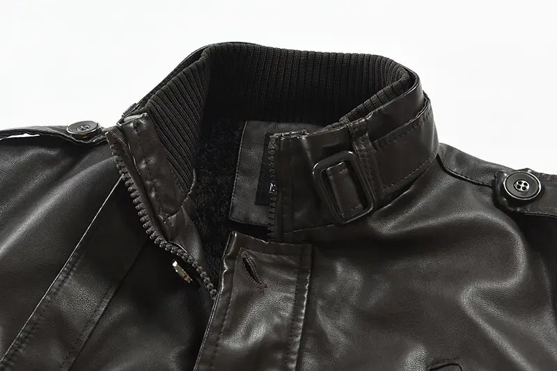 Men’s mid-length fleece lined black faux leather coat with a ribbed collar and adjustable strap shown from the back side