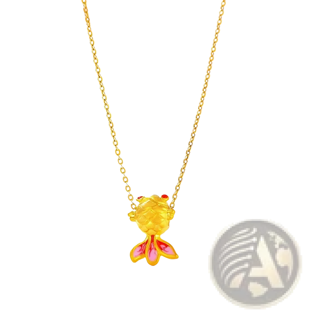 A delicate 24k gold fish pendant necklace with vibrant pink and red enamel accents on its fins