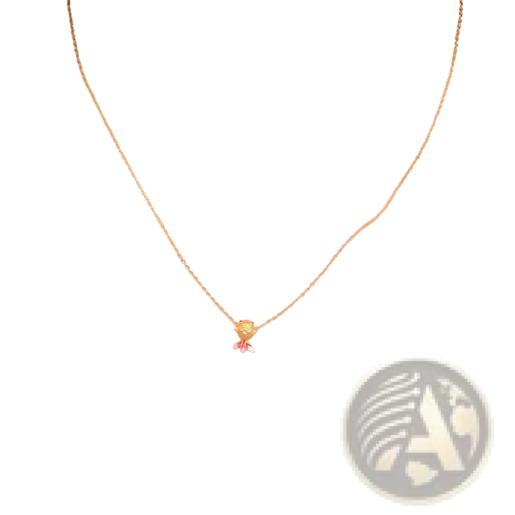 A 24k gold fish pendant necklace with a delicate chain and pink and yellow enamel details