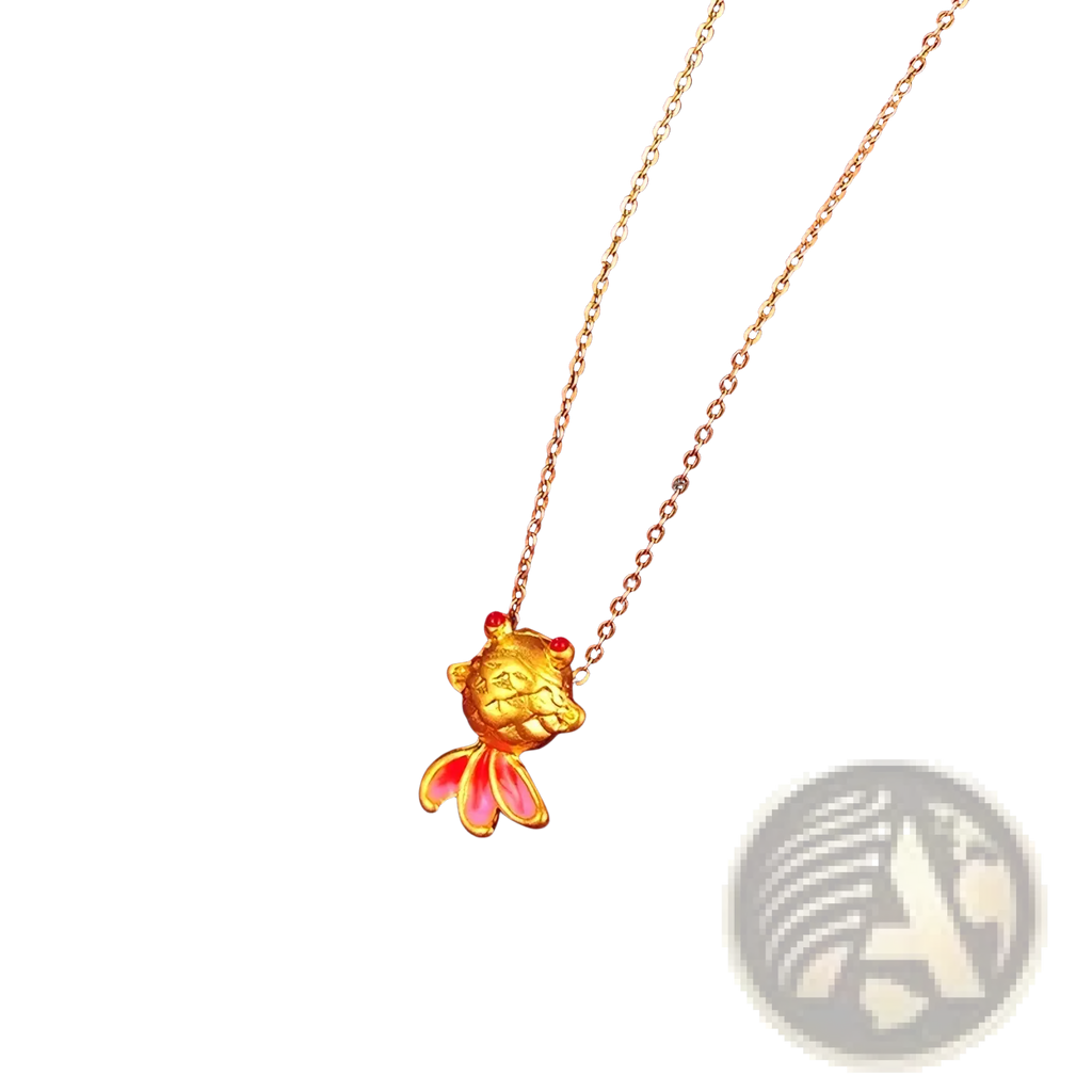 24k gold fish pendant necklace with pink enamel fins and red gemstone eyes in a fish shape