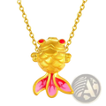 A 24k gold fish pendant necklace with red enamel eyes pink enamel fins crafted from 999 pure gold