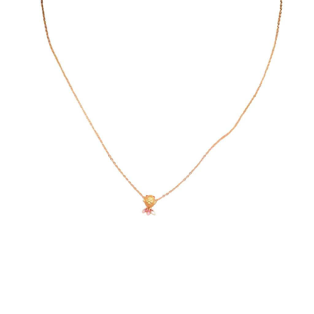 A 24k gold fish pendant necklace with a delicate chain and pink and yellow enamel details