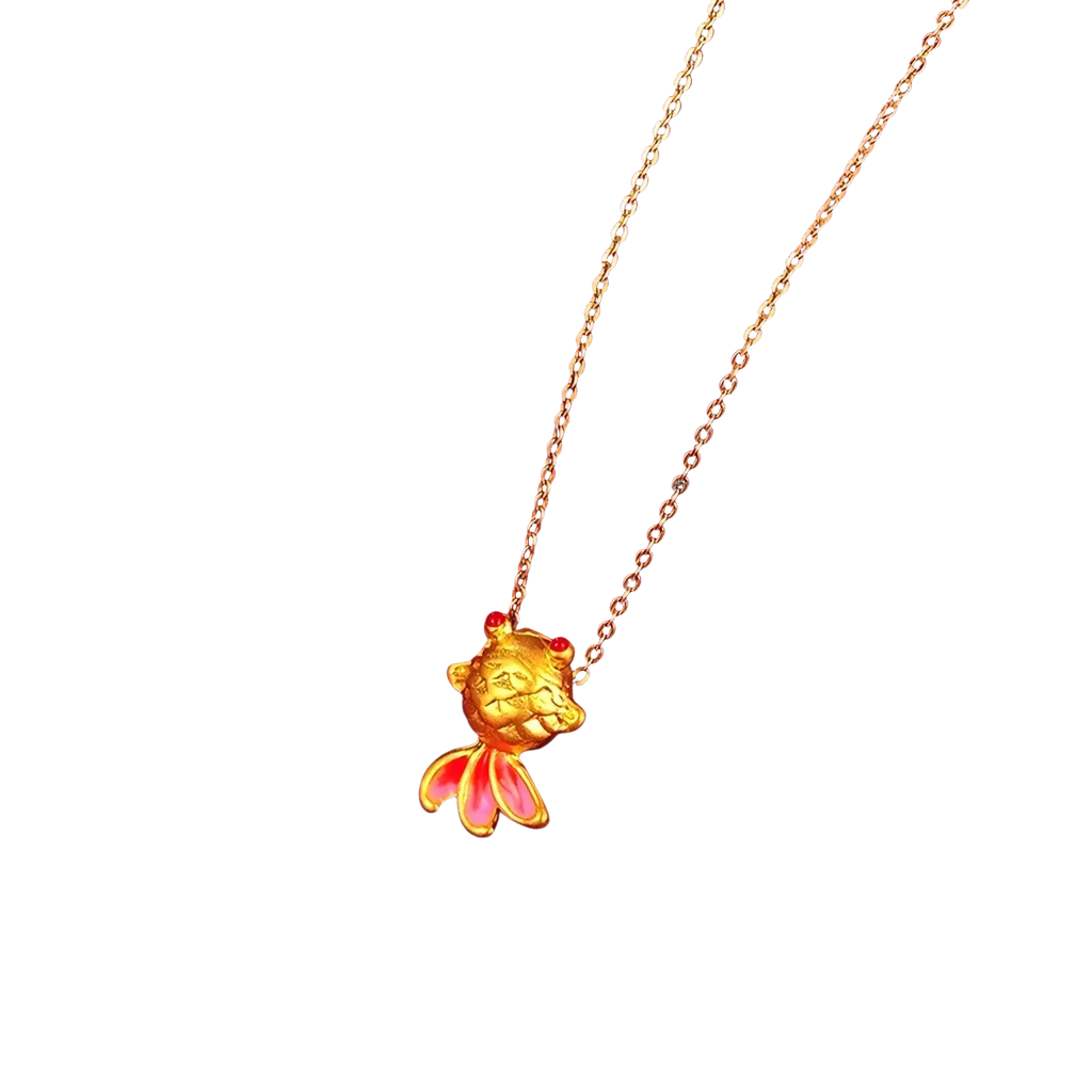 24k gold fish pendant necklace with pink enamel fins and red gemstone eyes in a fish shape