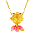 A 24k gold fish pendant necklace with red enamel eyes pink enamel fins crafted from 999 pure gold