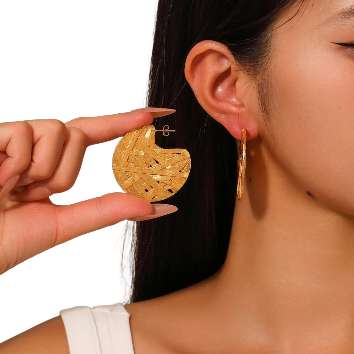 24k gold plated abstract drop earring with a woven textured pattern and ear post backing shown from the back side