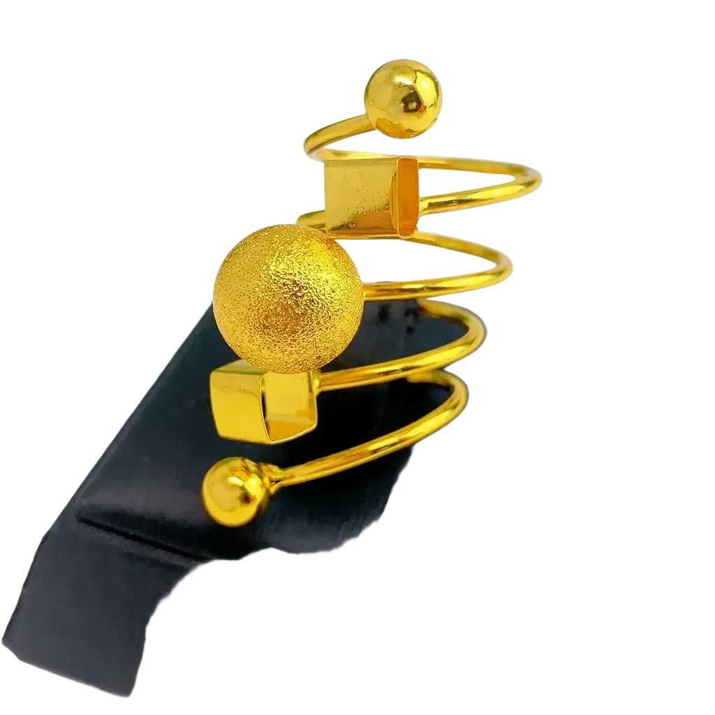 24k gold plated dubai jewelry spiral ring featuring textured and polished spheres with square accents and metallic finish