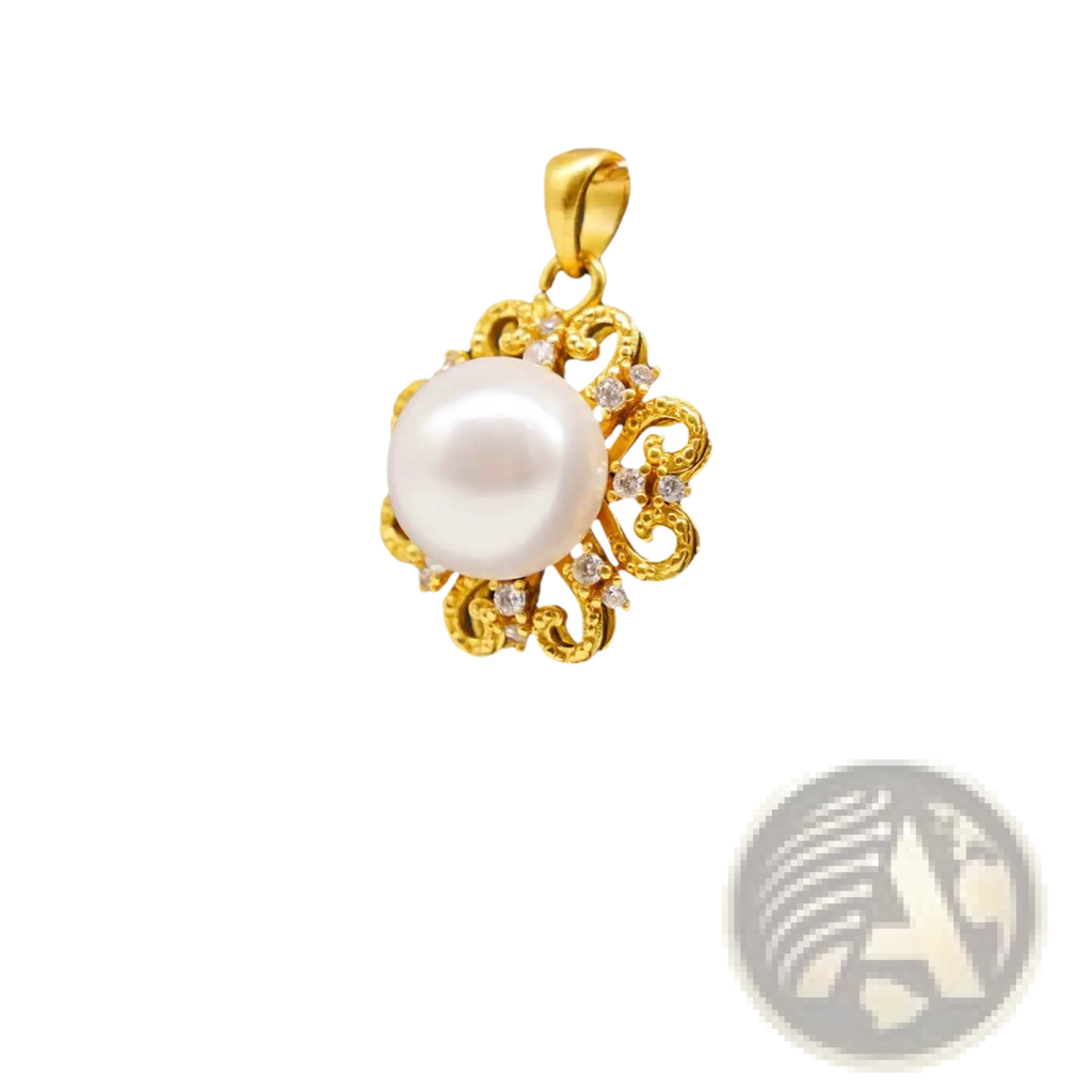 A 24k gold sun and pearl floral pendant necklace with a lustrous white pearl and ornate gold filigree frame adorned with clear gemstones