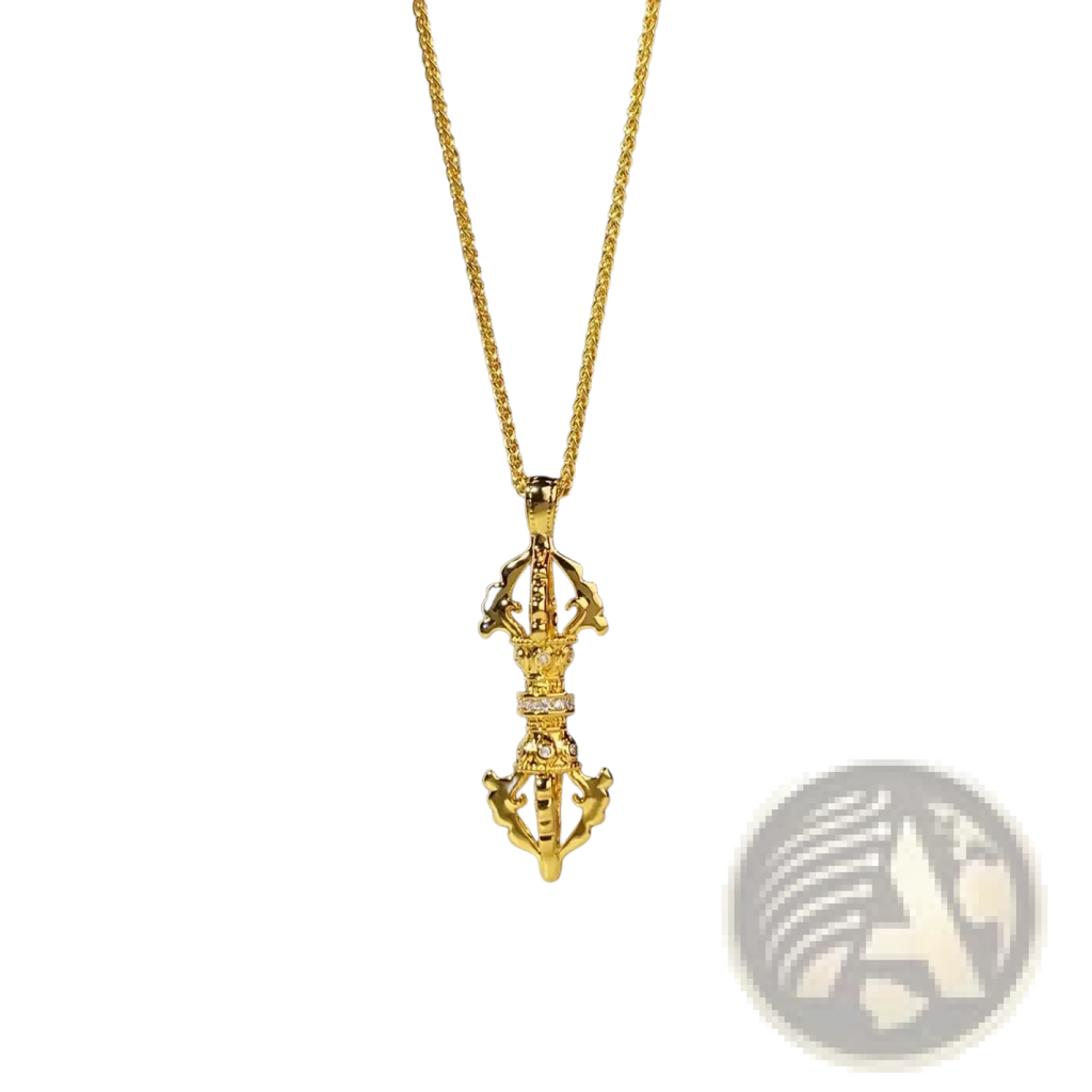 24k gold vajra pendant necklace with intricate detailing and a row of small diamonds along the center
