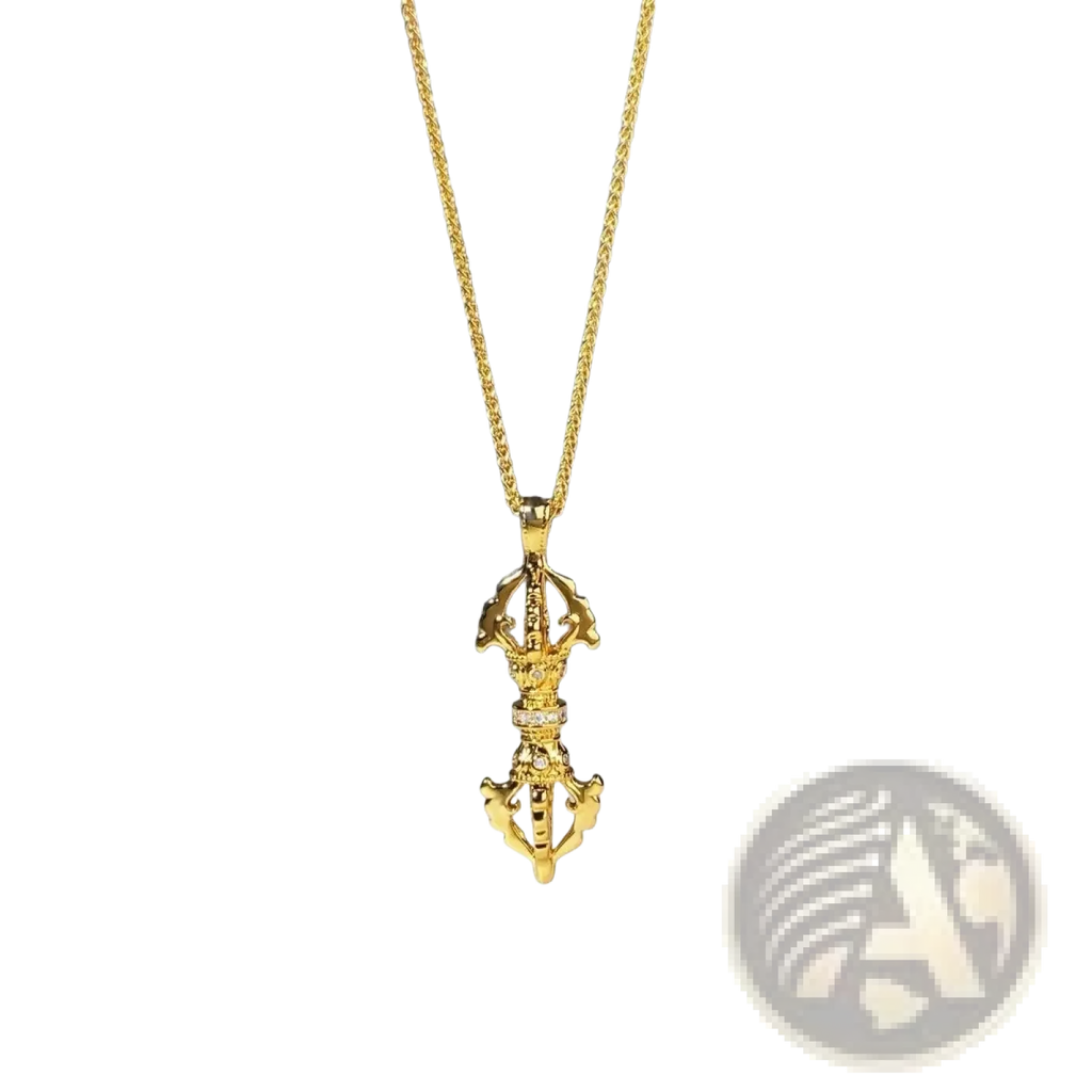 Gold-colored tibetan prayer wheel necklace with intricate design and small embedded stones in 24k gold vajra diamond pendant