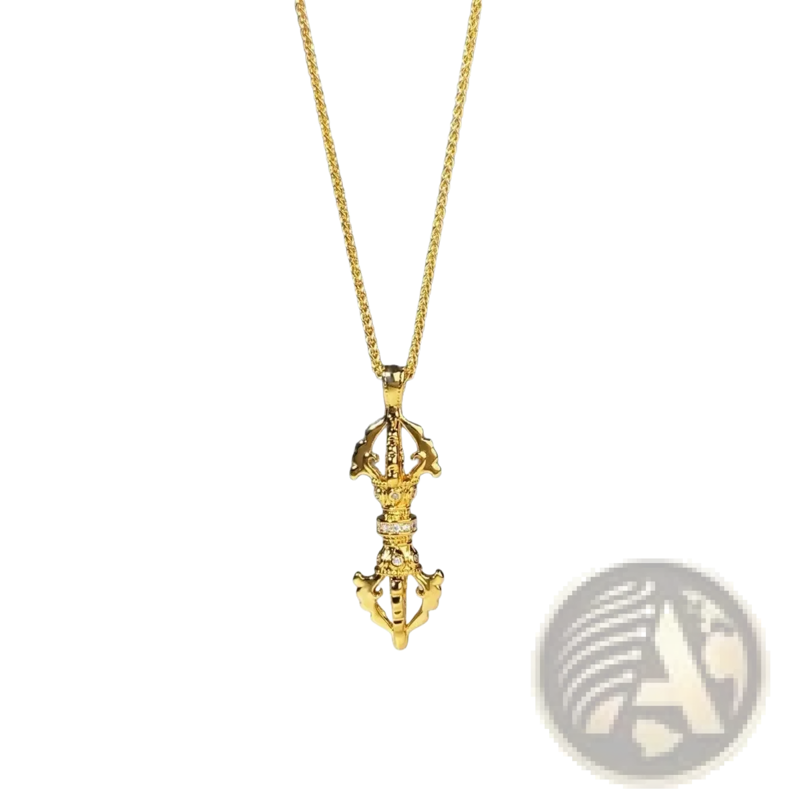 Gold-colored tibetan prayer wheel necklace with intricate design and small embedded stones in 24k gold vajra diamond pendant