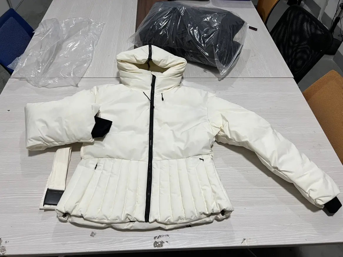 White belted hooded puffer coat with quilted design black zipper and cuffs for women