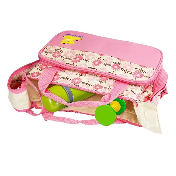pink baby changing bag with floral pattern and yellow bear appliqué from the 5 piece bear appliqué baby diaper travel bag set designed for convenient diaper storage and travel use